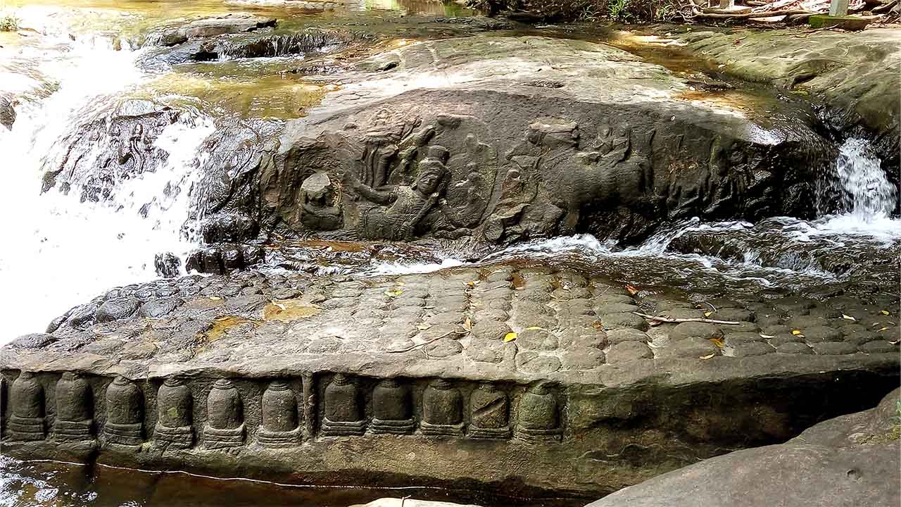 Carved river rock at Kbal Spean